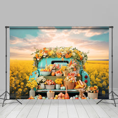 Aperturee - Blauer LKW Rapsblumen Eier Osterhintergrund