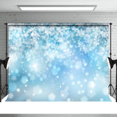 Aperturee - Bokeh Schneeflocken blauer Weihnachtshintergrund für Foto