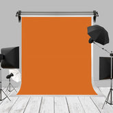 Aperturee - Orange einfarbiger Portrait Fotoautomaten Hintergrund