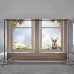 Aperturee - Kaninchen aus dem Fenster Blumen Regenbogen Ostertagsbanner