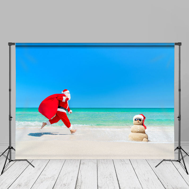 Aperturee - Weihnachtsmann läuft am Strand Weihnachten im Juli Hintergrund