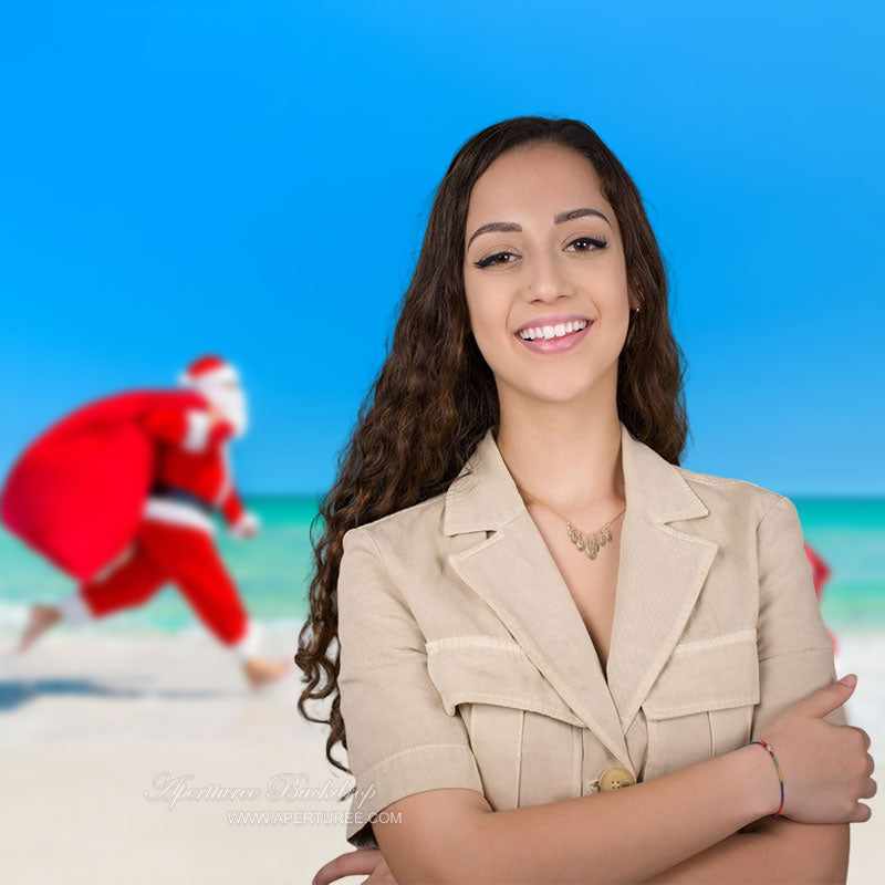 Aperturee - Weihnachtsmann läuft am Strand Weihnachten im Juli Hintergrund