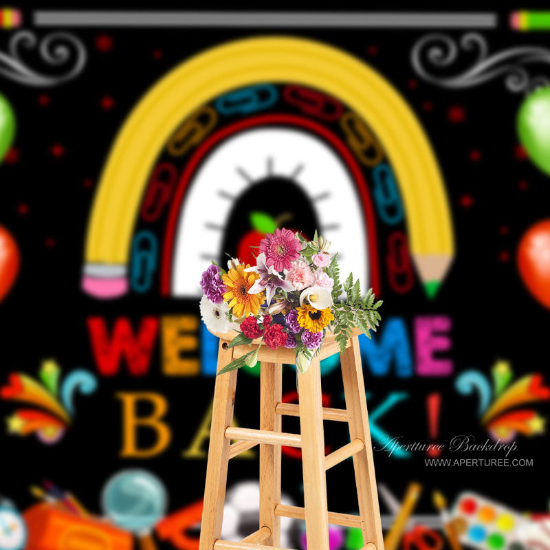 Aperturee - Schreibwaren Regenbogen Ballon Hintergrund für den Schulanfang