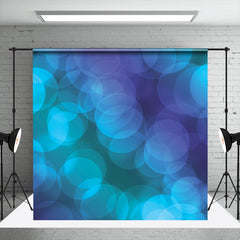 Blauer eleganter runder Halo Bokeh Fotostudio Hintergrund